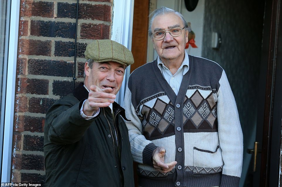 Nigel Farage canvasses voters on the general election campaign trail in Doncaster, northern England as he bids to avoid a no-seat humiliation at the polls