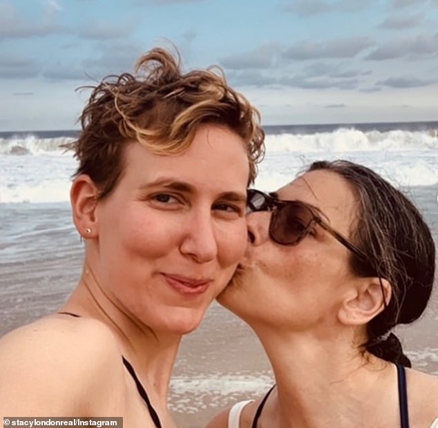 'NOT THAT IT’S ANY OF YOUR BUSINESS BUT... I may as well address all the stuff I hear floating around out there,' London (right) wrote. She revealed that she and Yezbak (left) have been happily dating for a year