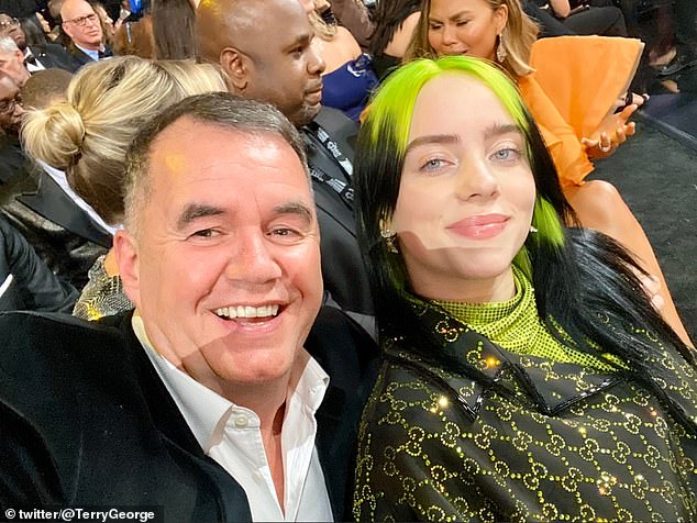 Terry George, 54, posing for a selfie with the five-time Grammy winner Billie Eilish at the Staples Centre in Los Angeles on Sunday night