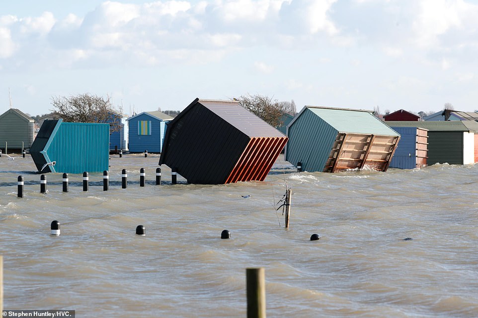 Brightlingsea floods, Tuesday. Many beach huts were displaced after the storm tide yesterday, with another storm surge tide today