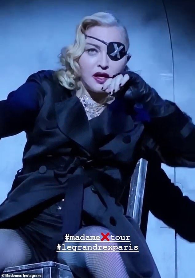 In pain: Madonna is said to have struggled to continue her Madame X show at Le Grand Rex in Paris on Thursday night