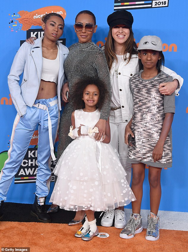 Family: In addition to Madison, Mel B is mom to daughters Phoenix, 21, whose father is her first husband Jimmy Gulzar, and Angel, 12, whose father is Hollywood star Eddie Murphy. the tri are pictured in LA in 2018 along with Belafonte's adult daughter Giselle