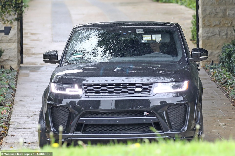 Outta here: Hailey was seen leaving the property in her Range Rover