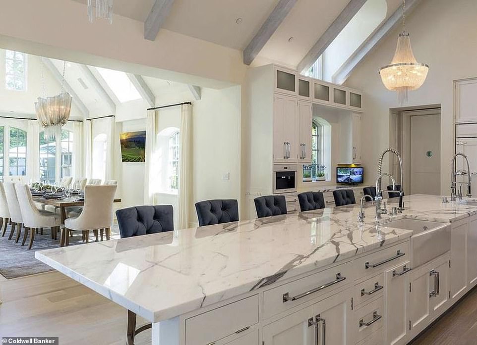 Wow factor: There is plenty of marble in the home including the gorgeous countertops in the kitchen