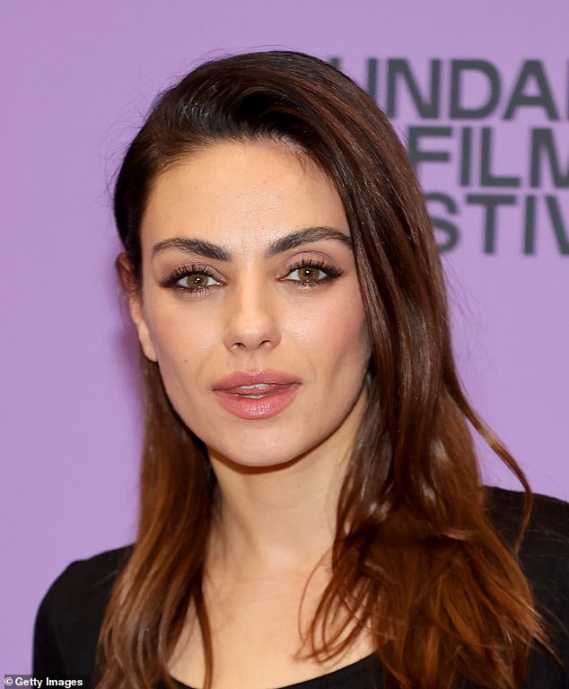 Mila Kunis, pictured at the Sundance Film Festival in January, has upturned eyes - also known as 'cat eyes'