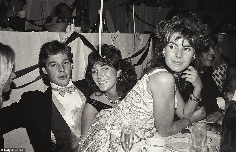 Impeccable connections: Oxford graduate Maxwell (middle) socialising with society pals at the Chelsea Arts Ball in 1985