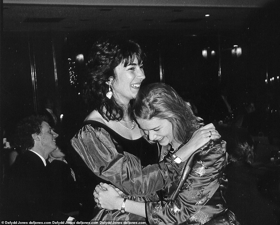 Gala Girls: Ghislaine Maxwell (left) gives a hug to aristocrat’s daughter Ariadne Beaumont (right) at a social event