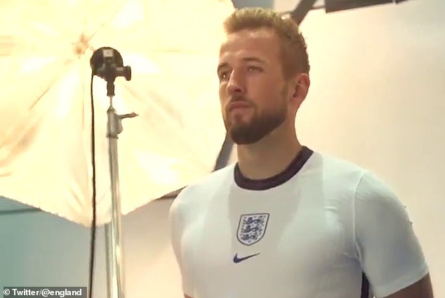 England captain Harry Kane pictured in the shirt the Three Lions will wear next summer