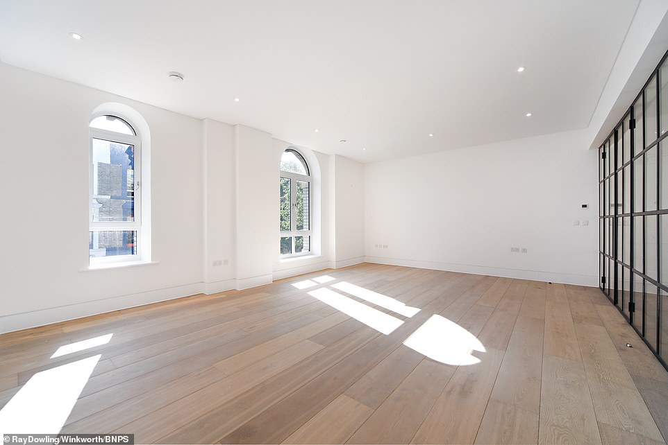 Tall windows let in plenty of light to the former chapel. In 2018 it stopped being used as a recording studio and was converted into nine luxury flats