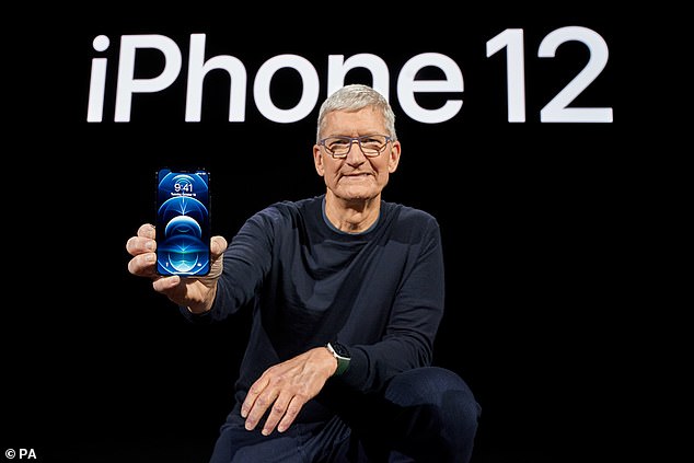 The iPhone 12's launch by Tim Cook, pictured, has helped boost Apple's profits