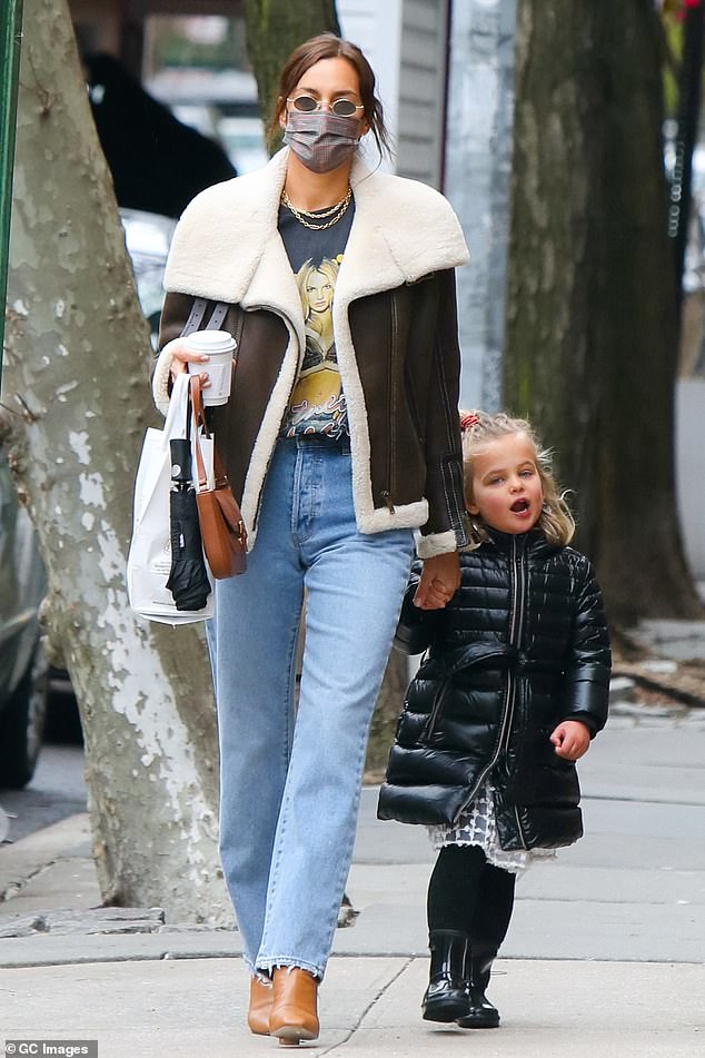 Out and about: Irina Shayk cut a stylish figure on Monday as she stepped out with mini me daughter Lea, four, in New York