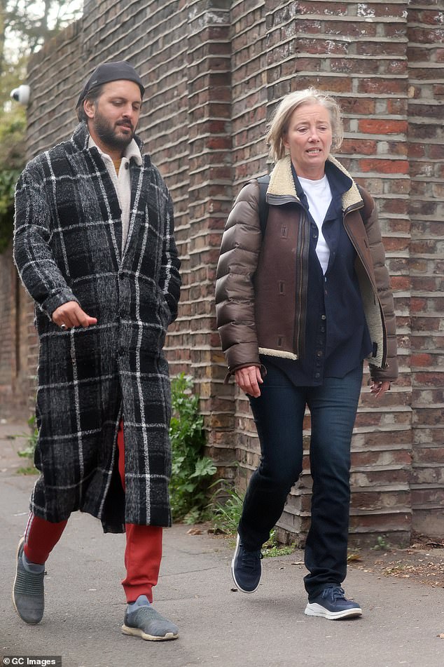 Casual: She finished her casual look with a pair of blue jeans and trainers