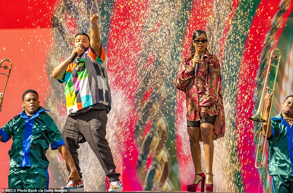 On stage: She had her long black locks died back in a pony tail with black sunglasses and black spandex shorts