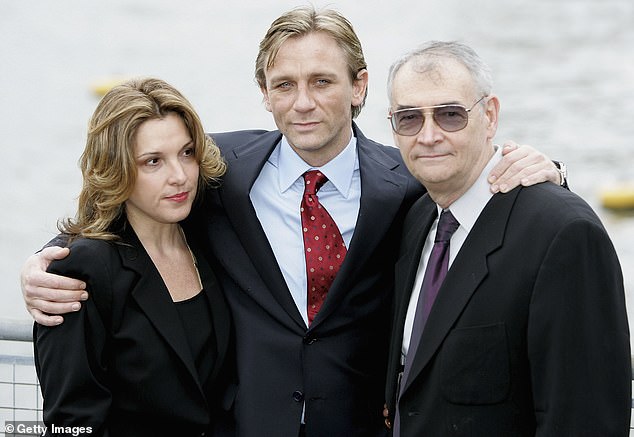 Daniel Craig poses with Barbara Broccoli and Michael Wilson as he is unveiled as the new James Bond in 2005