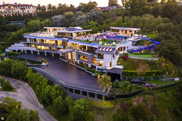 The party was held at this mega mansion in Bel Air. Guests were handed blue wristbands to get them in, while a select few were given gray wristbands that allowed them into 'the more exclusive sections' of the party and access to a dedicated weed bar