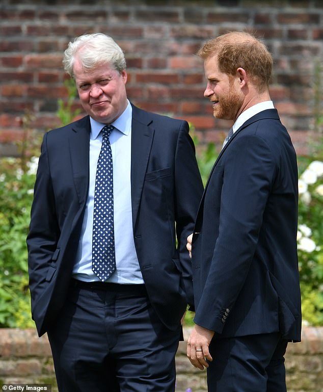 Lady Kitty's father Earl Charles Spencer, 57 - five years Michael's junior - was notably absent from the wedding (pictured on July 1 with Prince Harry at the unveiling of the new Princess Diana statue in London)