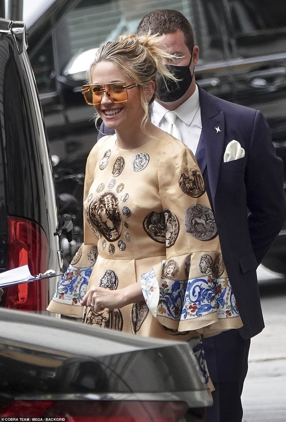 La dolce vita! Pixie looked perfectly dressed for the Italian summer in a silk number and 1970s style glasses for the second day of celebrations