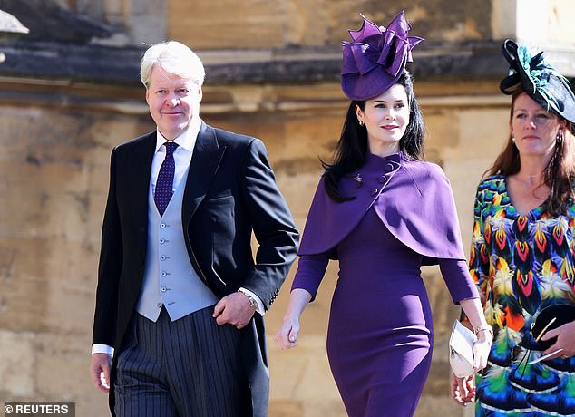 A source told Mail Online: 'Kitty and Charles were very close when she was growing up, but their relationship has cooled and been more distant since his marriage to his third wife Karen in 2011.' Pictured: Charles and Karen in 2018 at Prince Harry and Meghan Markle's wedding