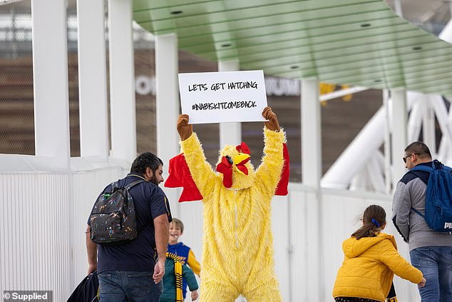 Last week, shoppers spotted a person dressed in a chicken suit holding a sign with the hashtag #InABiskitComeBack