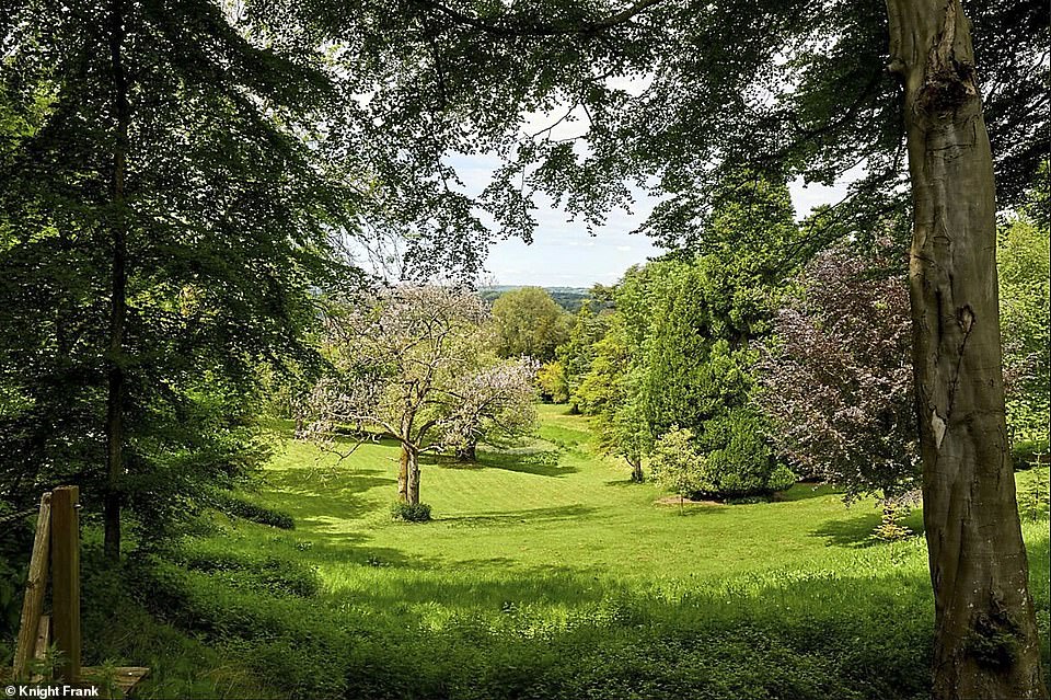 Rural retreat: 'Compton Bassett House has been the perfect escape for our family. The gardens and trees have enchanted us with their magic,' Robbie said of the estate