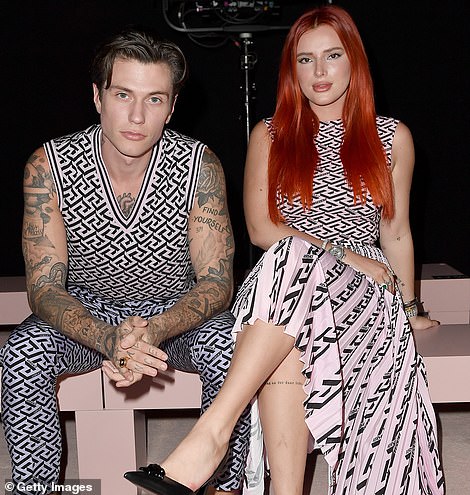 Coupled up: Benjamin Mascolo and Bella Thorne sat in the FROW