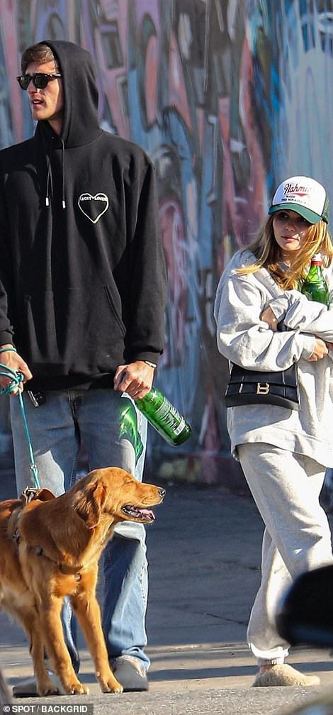 Staying hydrated: The duo carried bottles of water for the road