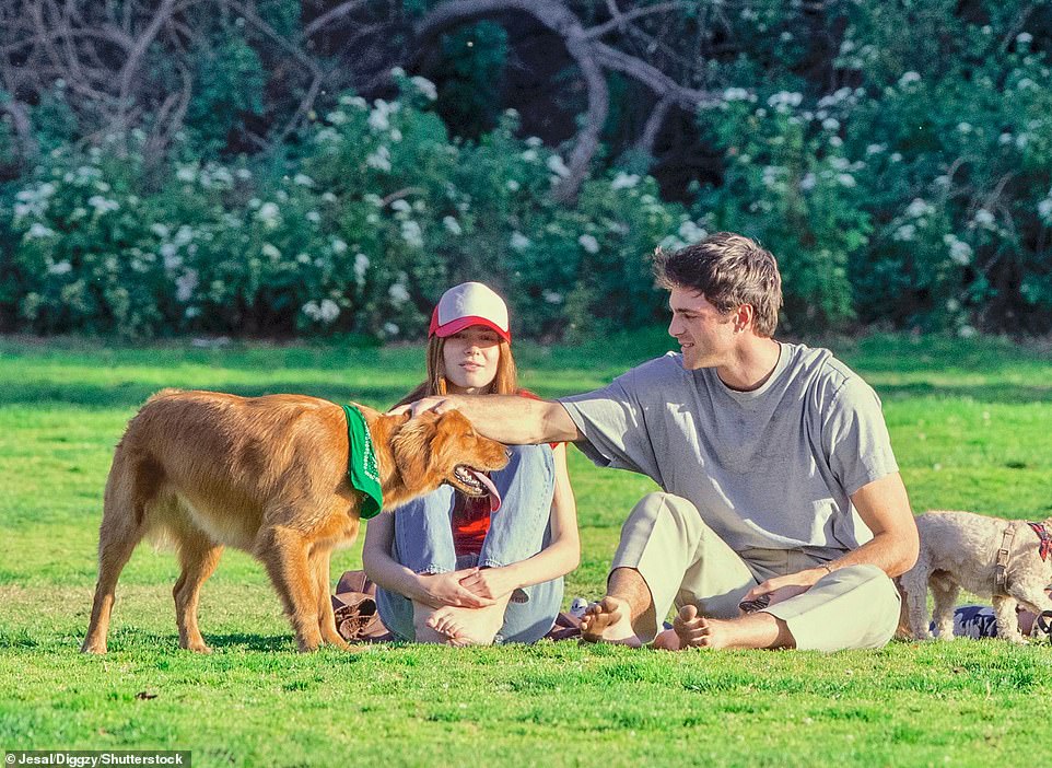 Man's best friend: They were accompanied by Elordi's golden retriever Layla and another puppy