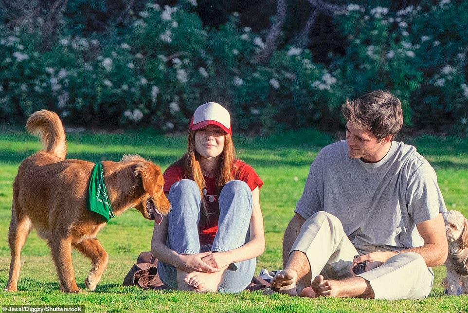 Happy days: The couple were seen smiling together while in the Los Angeles park