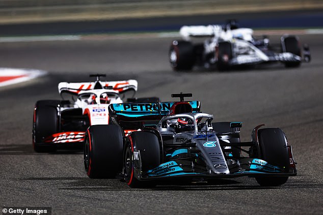 Russell (front) finished a place behind Hamilton in fourth during the Bahrain Grand Prix