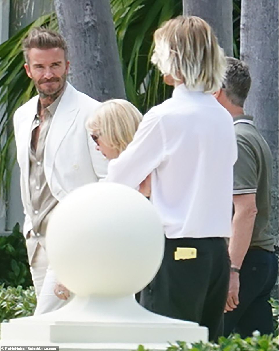 Brooklyn's father David is pictured arriving at Sunday's brunch in Palm Beach, Florida, after celebrating his oldest son's wedding