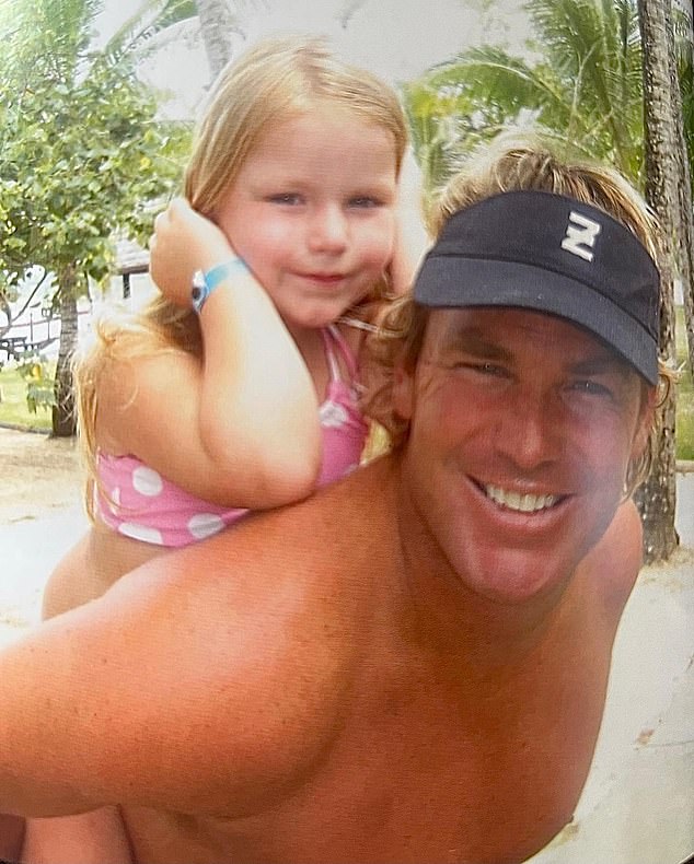 'Miss your smiley face every day dad': Shane Warne's youngest daughter Summer, 21, paid tribute to her late father on Instagram by sharing throwback family photos from her childhood on Monday