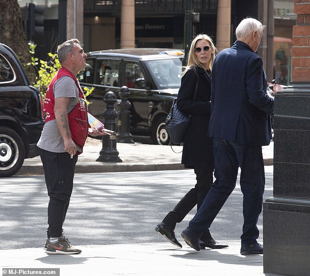 Chat: The couple were seen bidding farewell to the seller as they walked