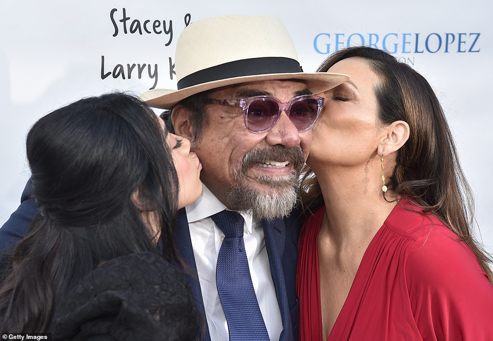 Affectionate: The actress, as well as her former costar, notably planted kisses on Lopez's cheeks while they posed for a set of snaps