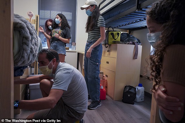 While masks are required in classrooms and laboratories, they are optional in 'informal gatherings,' like libraries, research laboratories, and dorms (pictured). The first day of classes at the Jesuit university started on Wednesday