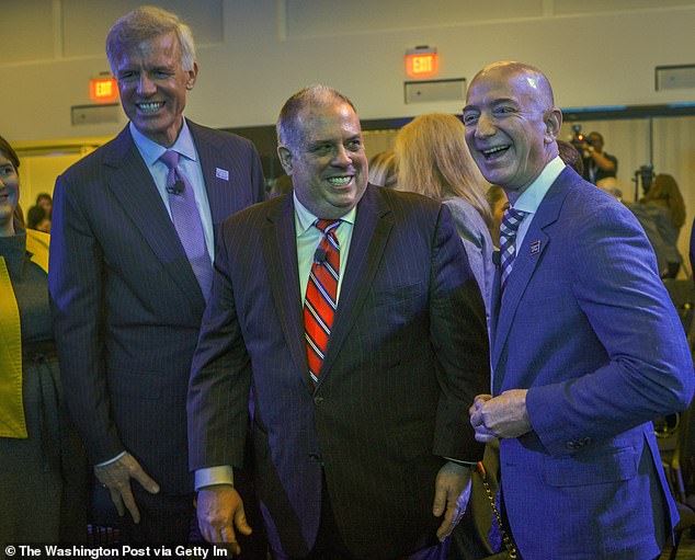 The Washington Post saw its digital ad revenue fall to $70 million during the first half of 2022, a 15 percent decrease from last year. Many are frustrated over the leadership of chief executive Fred Ryan (left) who was appointed by billionaire Jeff Bezos (right)