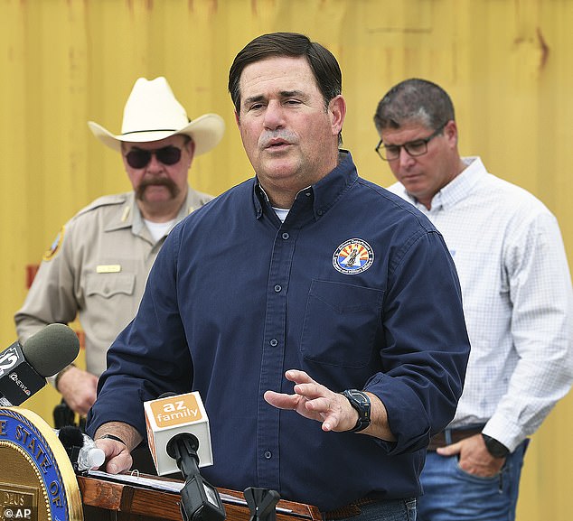 Tensions are high over increased border crossing through Arizona, where Gov. Doug Ducey (above) issued an executive order last month to create a make-shift border wall in Yuma