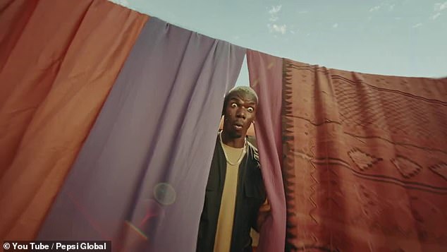 The new trailer starts with France midfielder Paul Pogba (above) reacting to a nutmeg