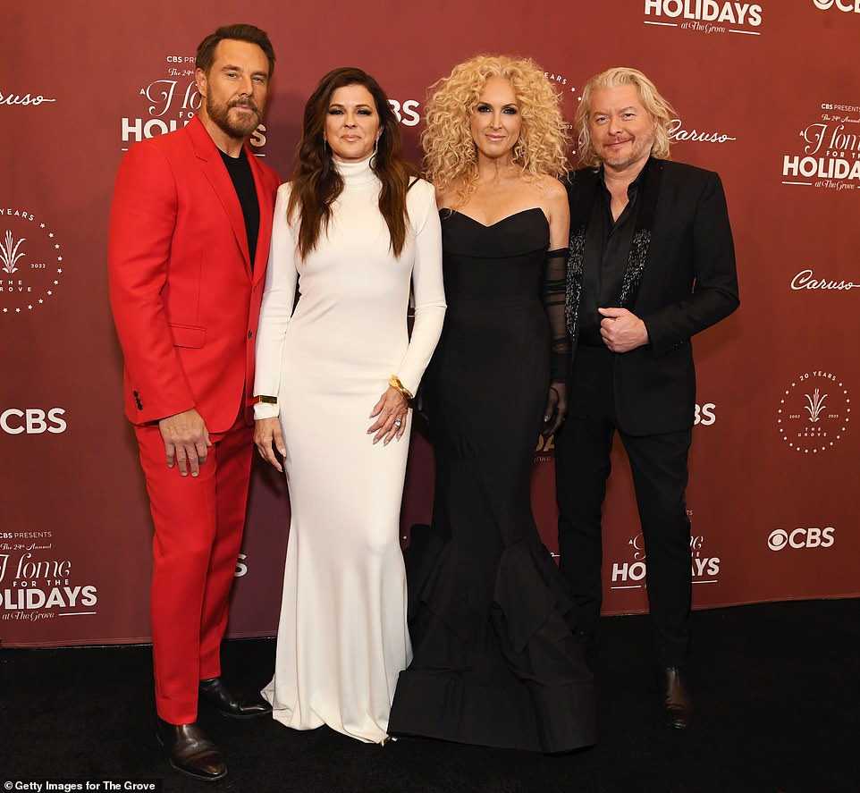 Looking good: Jimi Westbrook, Karen Fairchild, Kimberly Schlapman and Phillip Sweet posed for a snap at the party (pictured L-R)