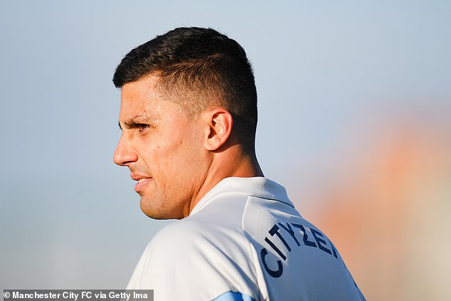 Rodri arrived back at Manchester City training after starting four games at centre-back for Spain