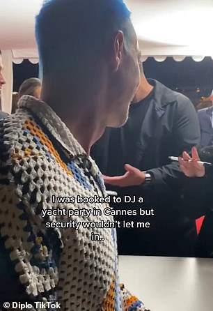 The video - began with the DJ trying to get into the party on a yacht