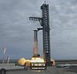 A Starship first-stage booster undergoes an engine-firing test at the launch pad in Boca Chica, Texas (SpaceX via AP)