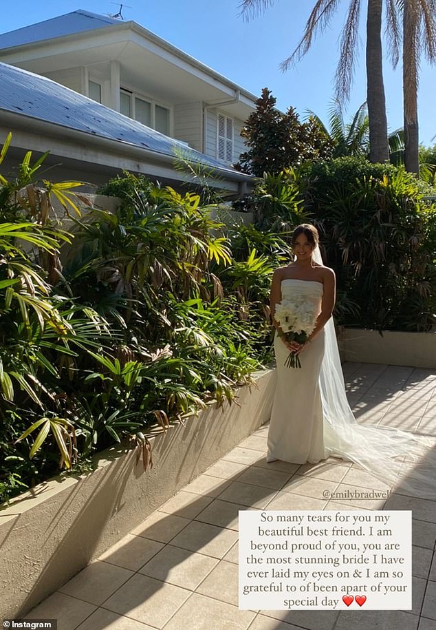 Emily completed her bridal look with a long white veil, and swept her long brunette locks back off her face to highlight her flawless makeup