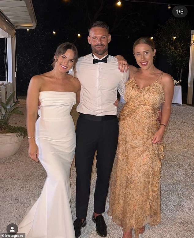 Carlin (centre) looked sharp on his big day in a white shirt and a black bow tie, while his bride (left) opted for a classic white dress with a strapless design