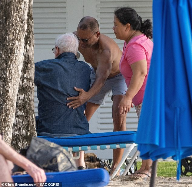 Helpful: He still appeared to need some help in getting on his feet with locals coming to the rescue