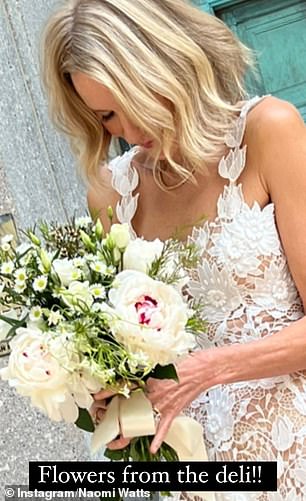 Naomi also shared a close-up photo of herself posing with her white bouquet, along with a caption that revealed she'd purchased her flowers from a local deli