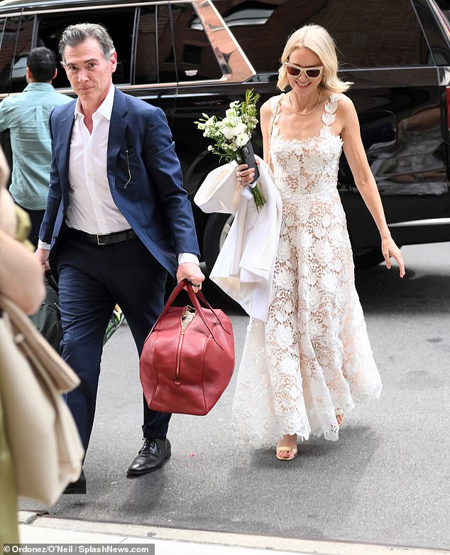 Naomi and Billy looked excited ahead of their wedding ceremony on Friday