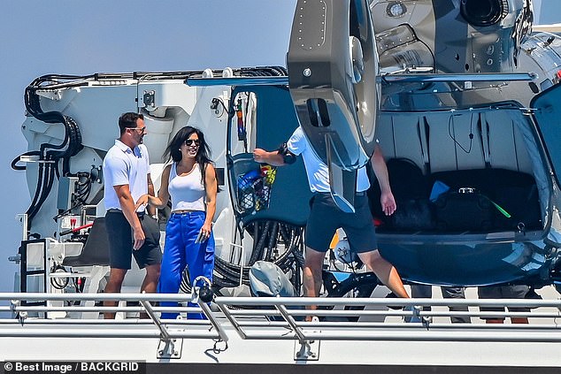 Sanchez was all smiles as the crew packed up her bags before she took off