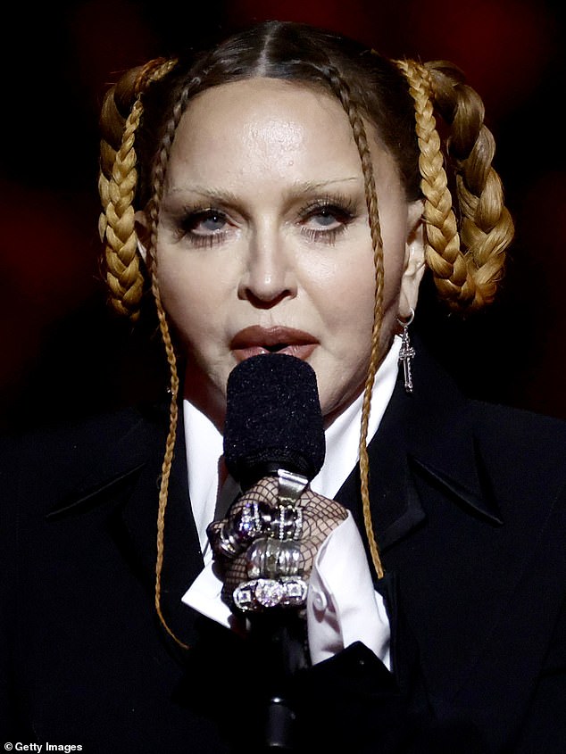 Concern: Earlier this year, Madonna sparked concern - and plastic surgery speculation - when she was seen modeling a drastically different appearance at the 2023 Grammy Awards