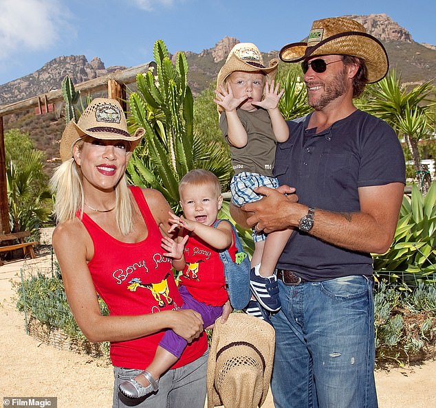 Now, a source has told DailyMail.com that the star may be plotting a major TV comeback. She is seen with ex-husband Dean Mcdermott and two of their kids in 2009