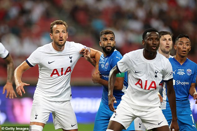 Kane (left) has been part of Spurs' pre-season but could leave before the start of the new Premier League campaign